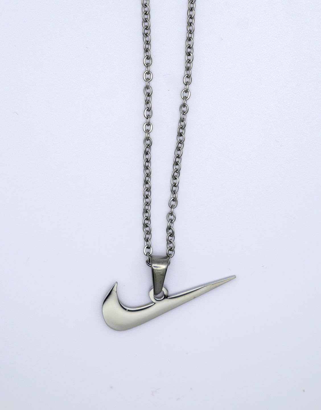 colgante con swoosh plata