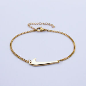 Pulsera fina dorada de acero con Swoosh ajustable
