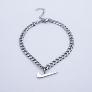 Tobillera plateada de cadena con Swoosh colgante
