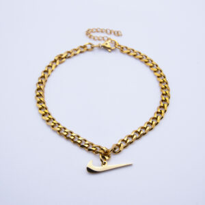 pulsera tobillera con swoosh dorada