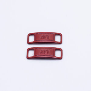 Hebillas para cordones de zapatillas granate